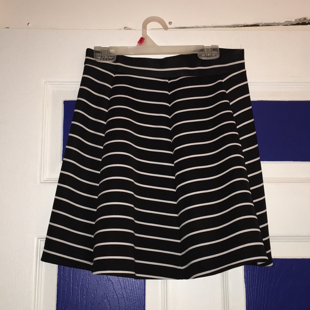 Black and white striped two piece outfit.